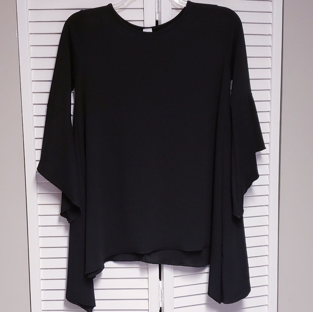NWOT SHARK BITE BLACK BLOUSE